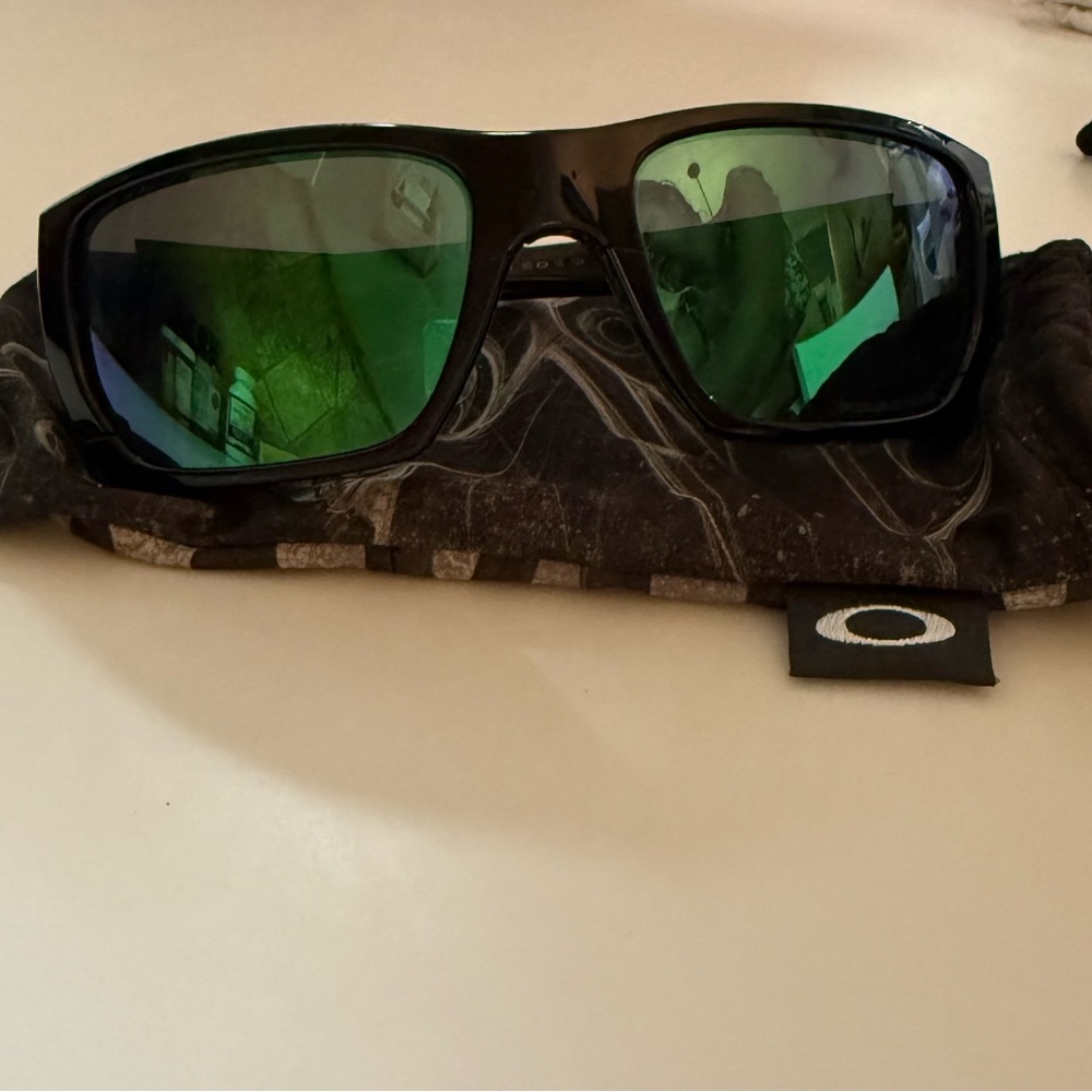 Used Oakley Black Sunglasses with Green Lenses